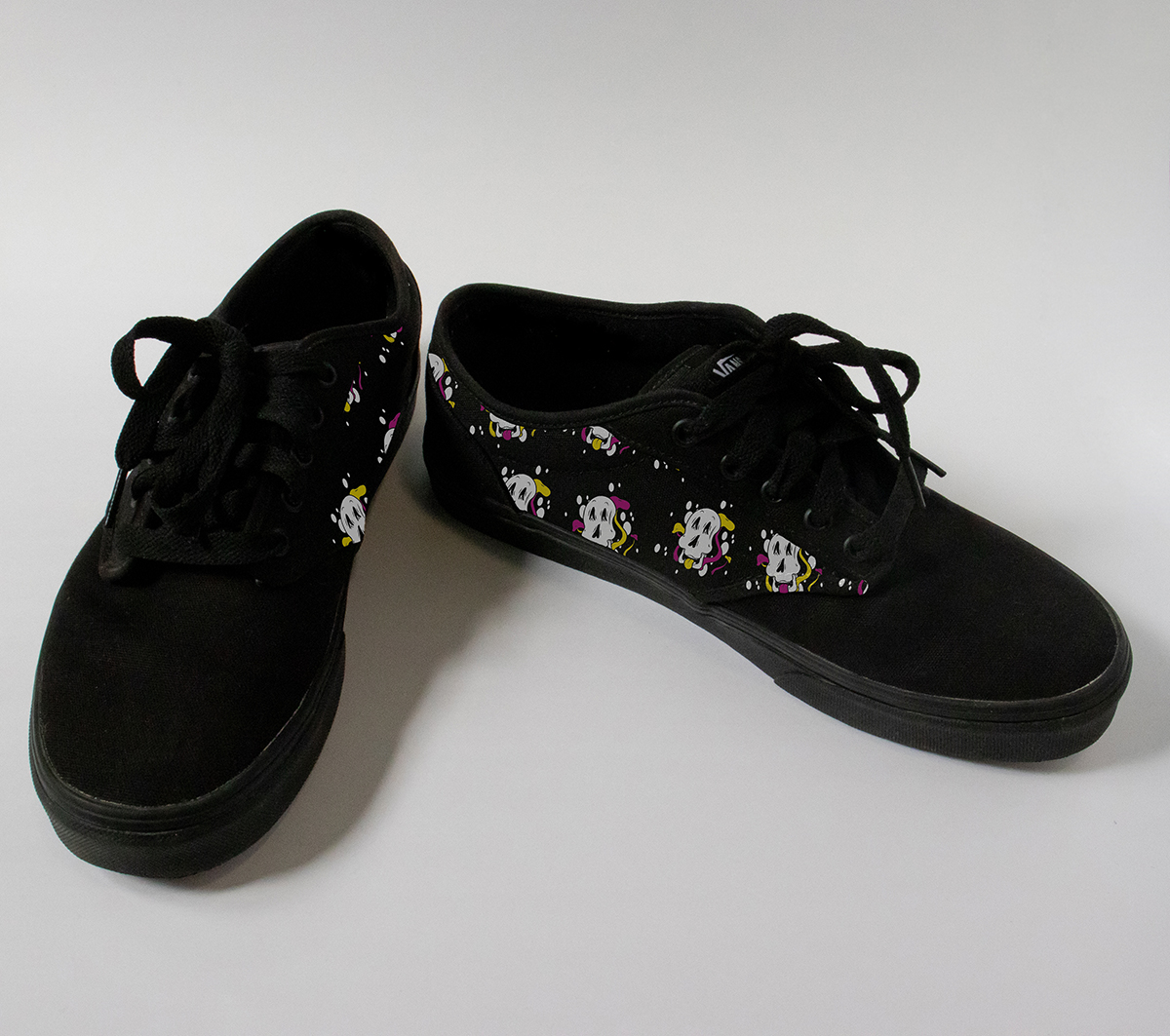 pair of shoes with skull pattern